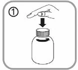 A finger pointing at a bottle
Description automatically generated